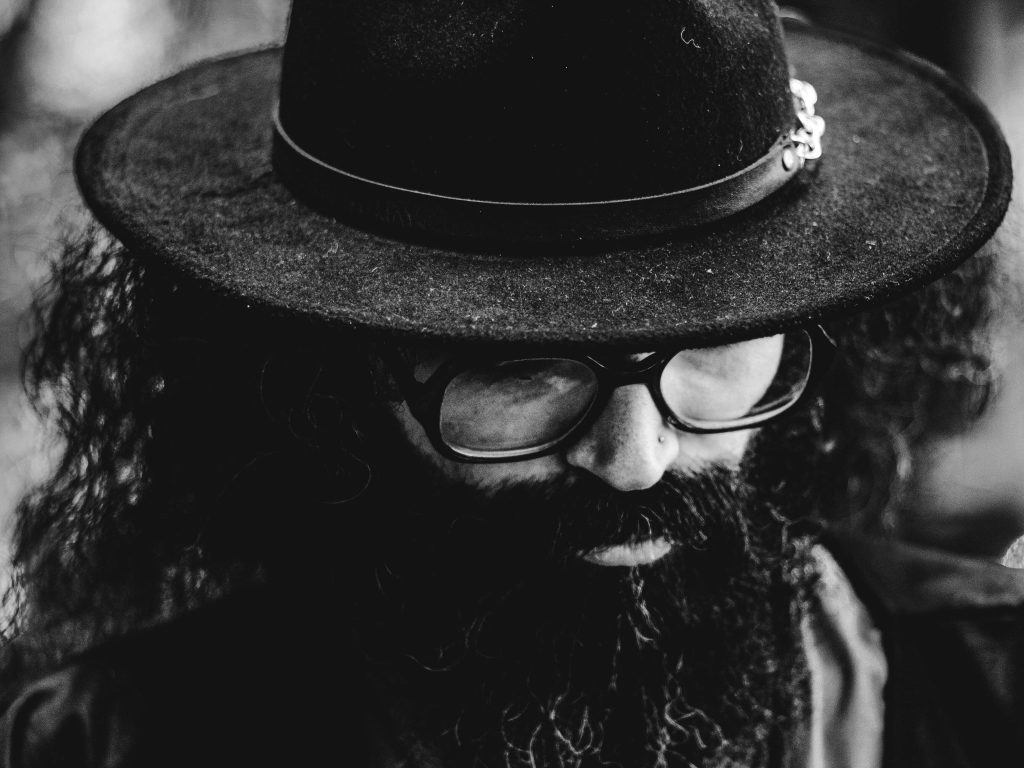 Black and white picture of man wearing luxury glasses
